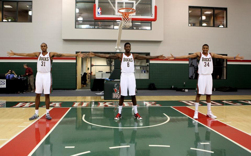 When Giannis Antetokounmpo (34) was a rookie, in 2013, folks were understandably fascinated by his long arms and impressive wingspan. He's seen here with teammates John Henson (11) and Larry Sanders (8).