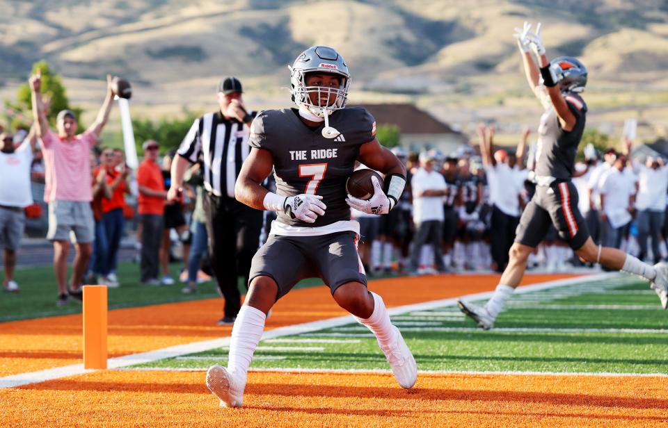 Skyridge’s Laa Kalama runs into the end zone for a touchdown against Timpview at Skyridge in Lehi on Friday, Aug. 11, 2023. Skyridge won 26-14. | Scott G Winterton, Deseret News