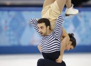 Sara Hurtado and Adria Diaz of Spain compete in the ice dance free dance figure skating finals at the Iceberg Skating Palace during the 2014 Winter Olympics, Monday, Feb. 17, 2014, in Sochi, Russia. (AP Photo/Darron Cummings)