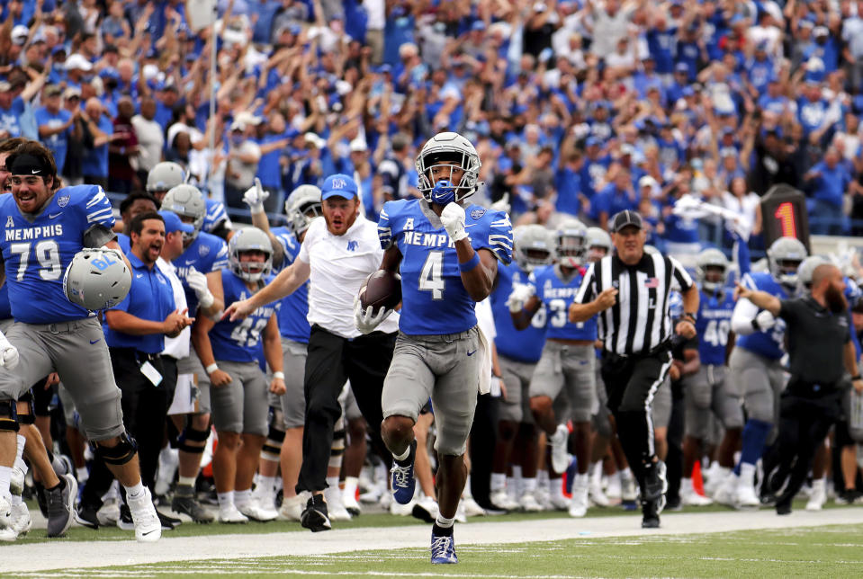 Memphis receiver Calvin Austin III (4) returns a long punt against Mississippi State during an NCAA college football game Saturday, Sept. 18, 2021, in Memphis, Tenn. (Patrick Lantrip/Daily Memphian via AP)