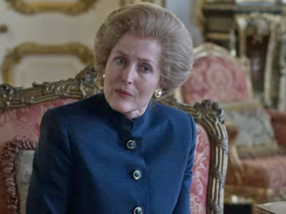 Gillian Anderson portraying margaret thatcher during a private audience with the queen on the crown