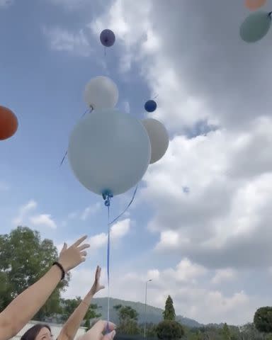 <p>Jasmine Yong/Instagram</p> Jasmine Yong's photo of a balloon ceremony for Enzo