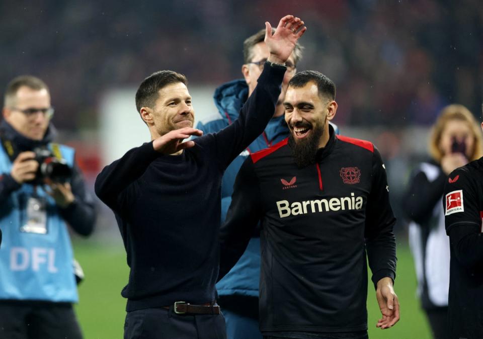 Alonso celebrated with his team after orchestrating Bayer Leverkusen’s 3-0 victory over Bayern Munich (Reuters)