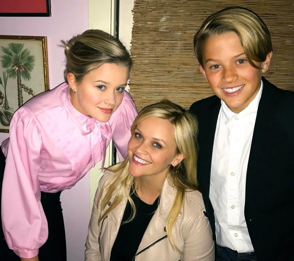 Reese Witherspoon with two of her children.