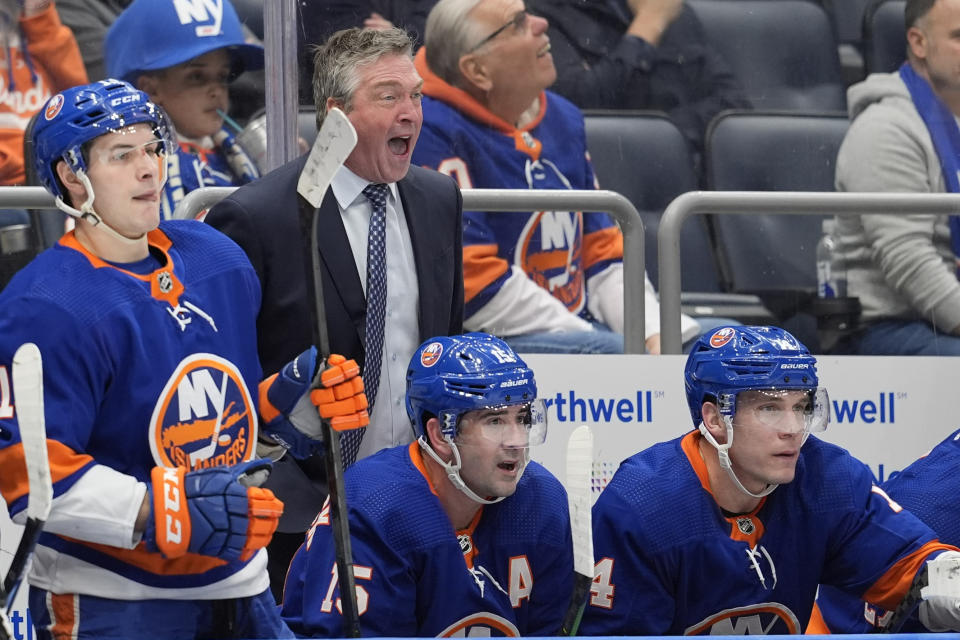 New York Islanders head coach Patrick Roy, second from left, reacts during the first period of an NHL hockey game against the Dallas Stars, Sunday, Jan. 21, 2024, in Elmont, N.Y. (AP Photo/Mary Altaffer)