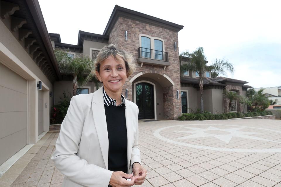Realtor Linda Sicotakis stands in front of an oceanfront luxury home in Ormond Beach that she sold in December on Tuesday January 16, 2024. The $6.2 million sale price was the highest paid for a single-family home in Volusia County in 2023 and second-most ever.