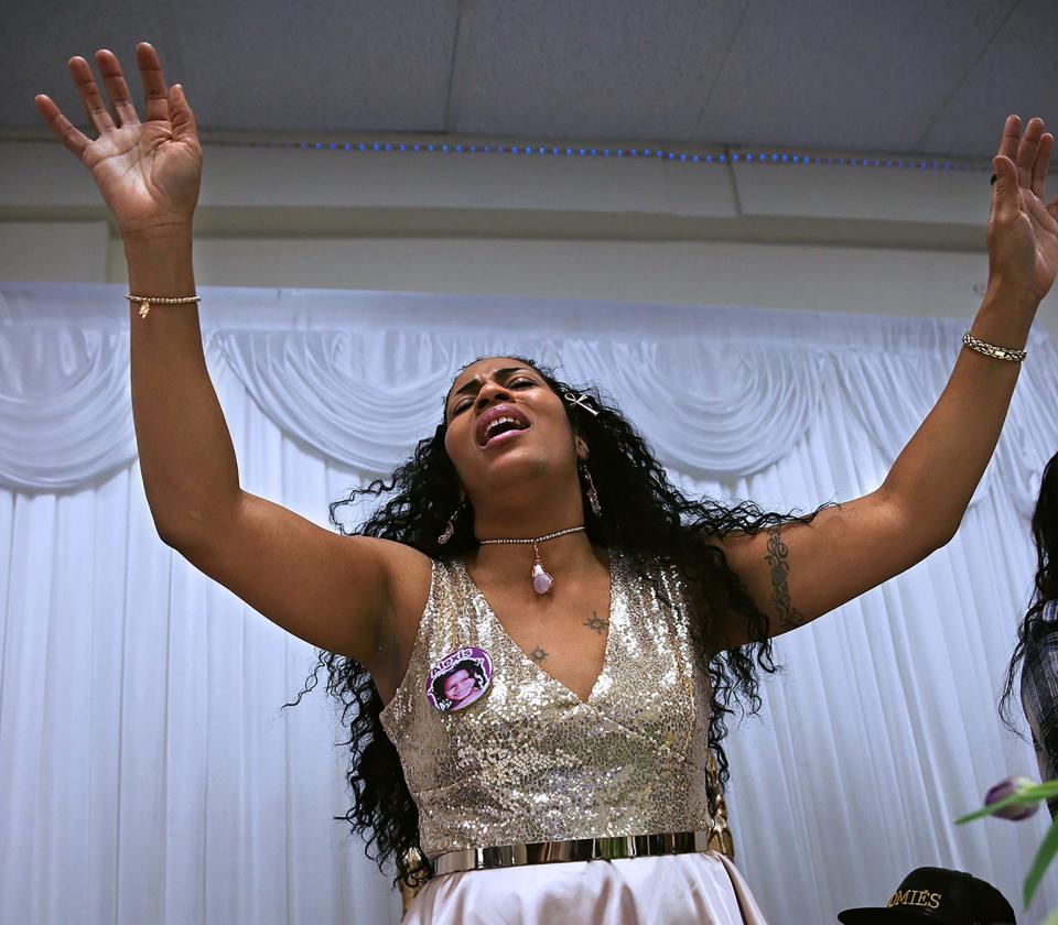 Ayanna Patterson, the mother of Alexis Patterson who has been missing since 2002,  reacts during the singing of gospel song, “The battle is not yours, it’s the Lord”, during a program called  “20th Year Awakening Celebration” on Sunday, May 1, 2022. During the event many shared fond memories about the child like her former Head Start teacher Benedicata Graves, “She always had a beautiful smile for everyone,” she said.