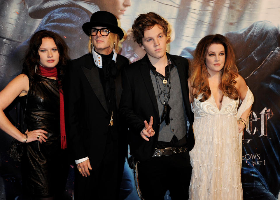 LONDON, ENGLAND - NOVEMBER 11:  (EMBARGOED FOR PUBLICATION IN UK TABLOID NEWSPAPERS UNTIL 48 HOURS AFTER CREATE DATE AND TIME. MANDATORY CREDIT PHOTO BY DAVE M. BENETT/GETTY IMAGES REQUIRED)  (L to R) Guest, Michael Lockwood, Ben Keough and Lisa Marie Presley attend the World Premiere of Harry Potter And The Deathly Hallows: Part 1 at Odeon Leicester Square  on November 11, 2010 in London, England.  (Photo by Dave M. Benett/Getty Images)