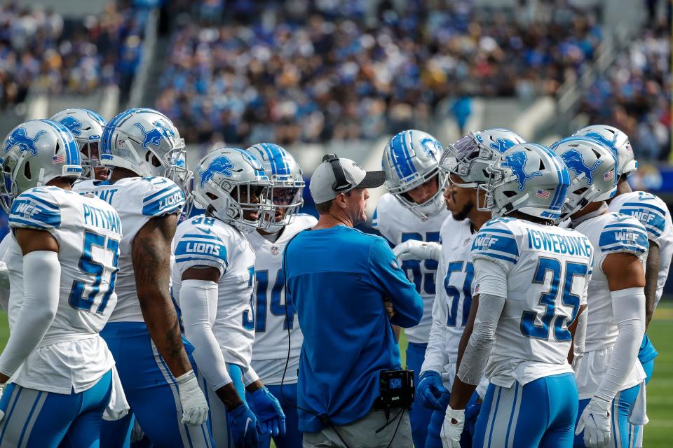 Detroit Lions special team coordinator Dave Fipp, center, talks to players during the first half against Los Angeles Rams at the SoFi Stadium in Inglewood, Calif. on Sunday, Oct. 24, 2021.