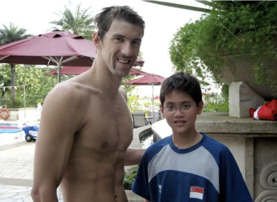 A young Joseph Schooling with Michael Phelps - eight years before pipping him to Olympic glory. (Credit: The Schooling Family)