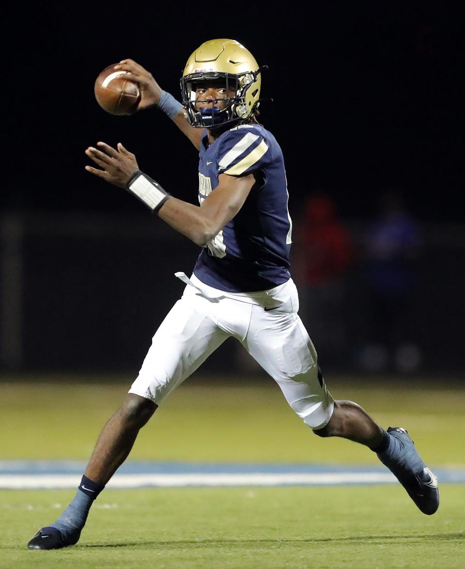 Tylan Boykin can do it with his arm and his legs for Hoban football.