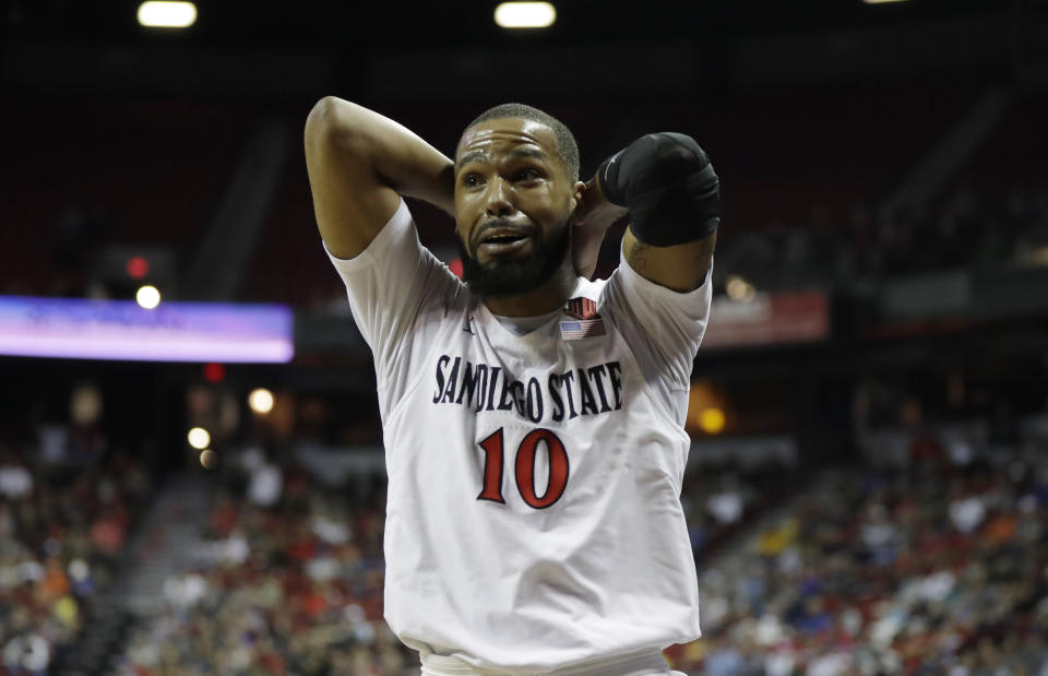 San Diego State's KJ Feagin reacts during the first half of a Mountain West Conference tournament NCAA college basketball game against Boise State on Friday, March 6, 2020, in Las Vegas. (AP Photo/Isaac Brekken)