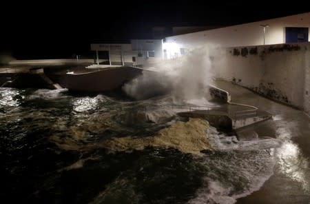 Waves crash on a wall along the coast near Angra do Heroismo, before the arrival of Hurricane Lorenzo in Azores