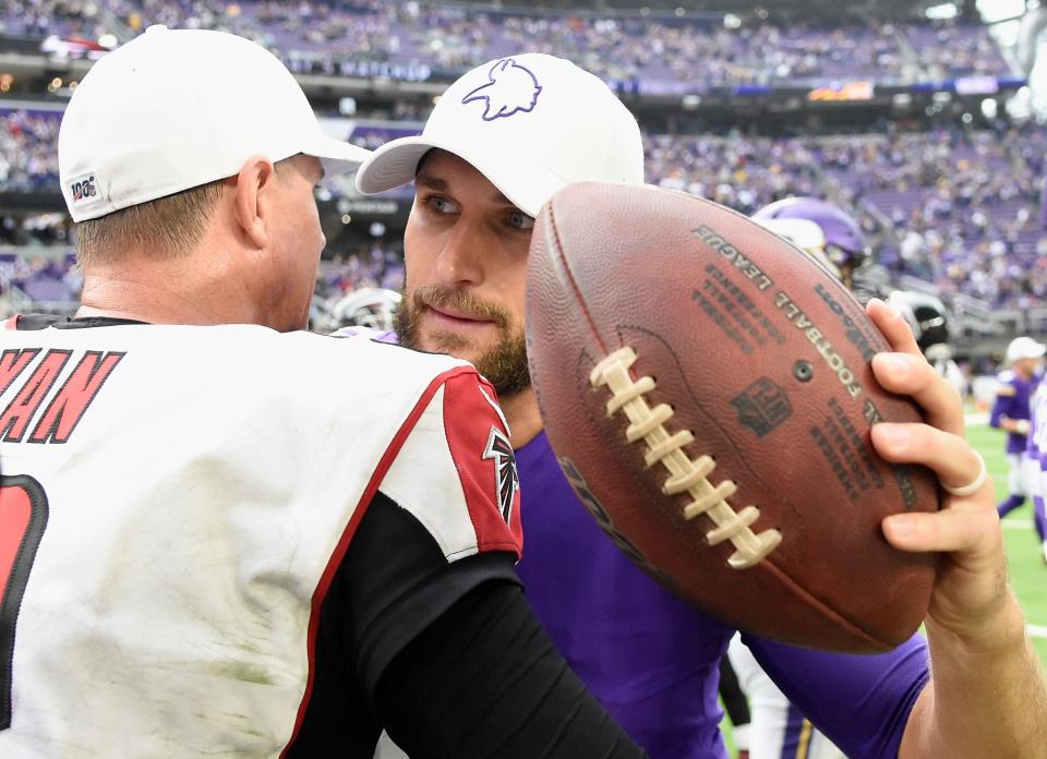 MINNEAPOLIS, MINNESOTA - SEPTEMBER 08: Matt Ryan #2 of the Atlanta Falcons and Kirk Cousins #8 of the Minnesota Vikings hug after the game at U.S. Bank Stadium on September 8, 2019 in Minneapolis, Minnesota. The Vikings defeated the Falcons 28-12. (Photo by Hannah Foslien/Getty Images)