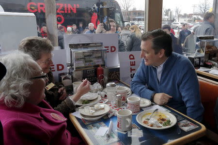 Ted Cruz greets diners after speaking during a campaign stop at Lindy's Diner in Keene, New Hampshire. REUTERS/Brian Snyder