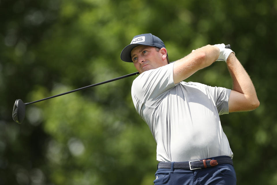 Michael Thompson watches his shot. 