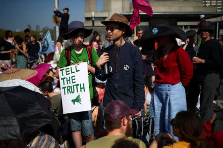 Climate change activists attend the Extinction Rebellion protest at Waterloo Bridge in London, Britain April 21, 2019. REUTERS/Hannah McKay