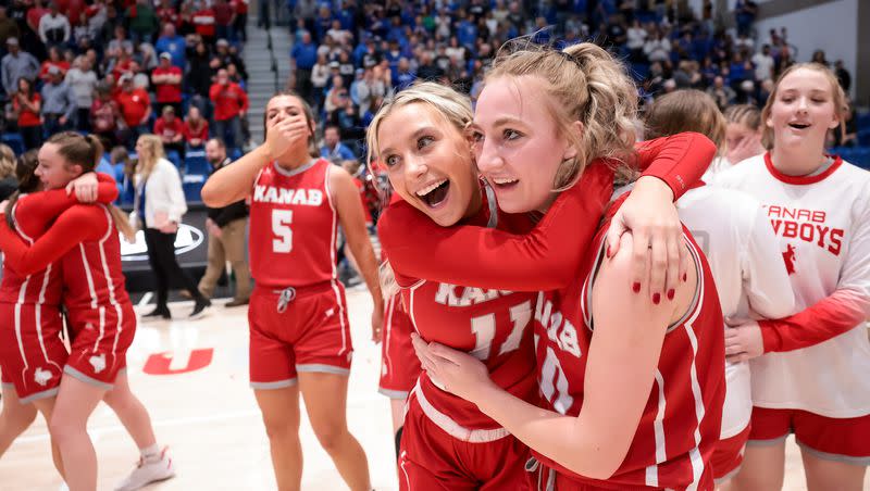 Kanab’s Emilie Gilberg and Taylor Janes celebrate their team’s win over Beaver in the 2A high school girls basketball championship game at Salt Lake Community College in Taylorsville on Saturday, Feb. 25, 2023.