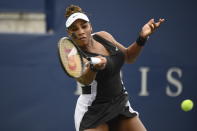 Serena Williams, of the United States, returns the ball during a match with Nuria Parrizas-Diaz, of Spain, during the National Bank Open tennis tournament in Toronto, Monday, Aug. 8, 2022. (Christopher Katsarov/The Canadian Press via AP)