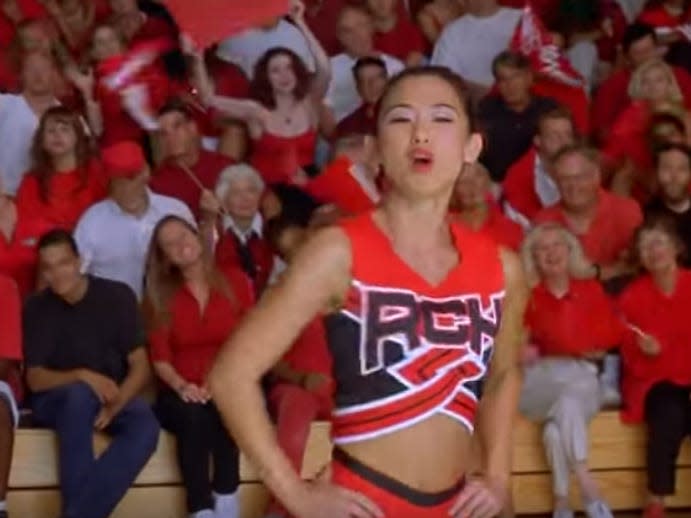 nicole bilderback wearing red cheer outfit in bring it on