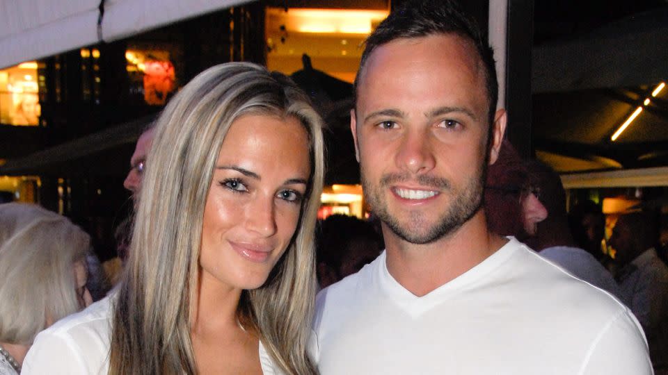 Oscar Pistorius poses next to his girlfriend Reeva Steenkamp in Johannesburg on January 26, 2013. - Waldo Swiegers/AFP/Getty Images