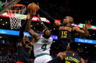 Apr 22, 2016; Boston, MA, USA; Atlanta Hawks center Al Horford (15) and forward Paul Millsap (4) defend against Boston Celtics guard Isaiah Thomas (4) during the second quarter in game three of the first round of the NBA Playoffs at TD Garden. Mandatory Credit: David Butler II-USA TODAY Sports