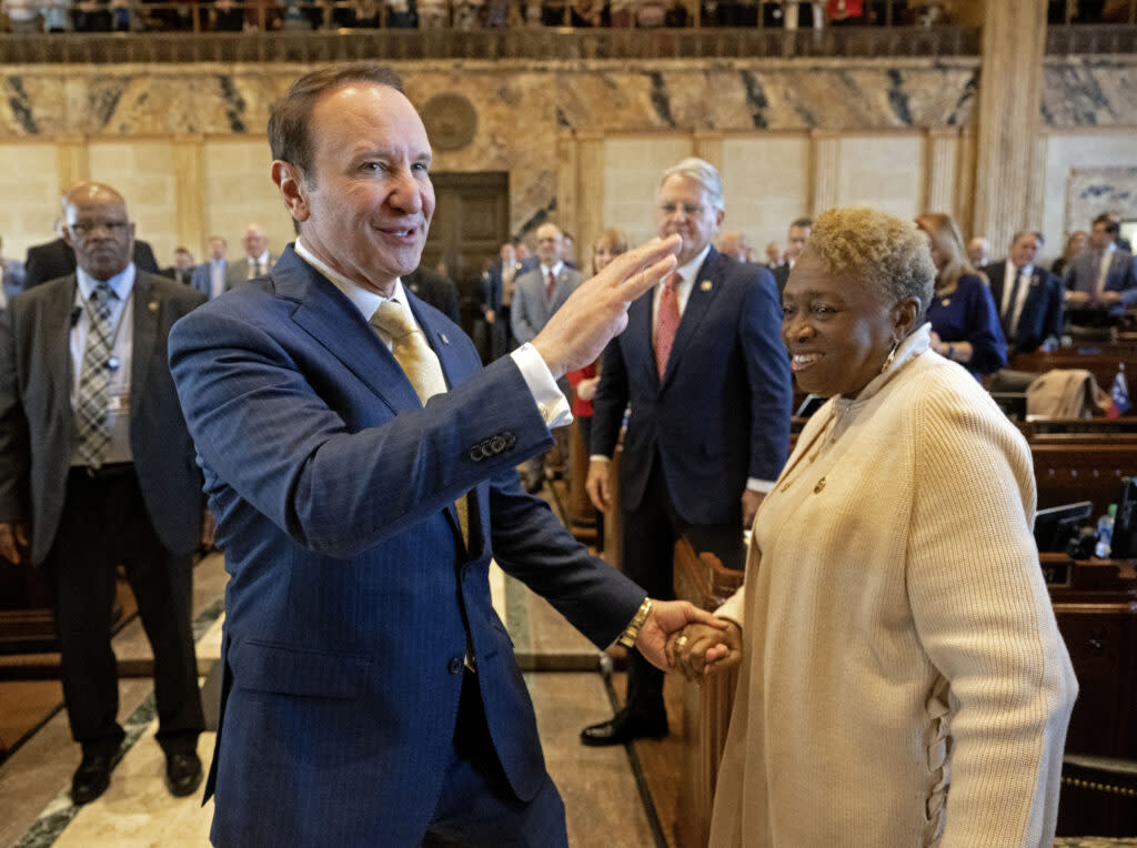 Louisiana Gov. Jeff Landry, left, greets Rep. Barbara Carpenter, D-Baton Rouge, on opening day of a legislative special session focusing on crime, Feb. 19, 2024, at the Louisiana State Capitol in Baton Rouge.