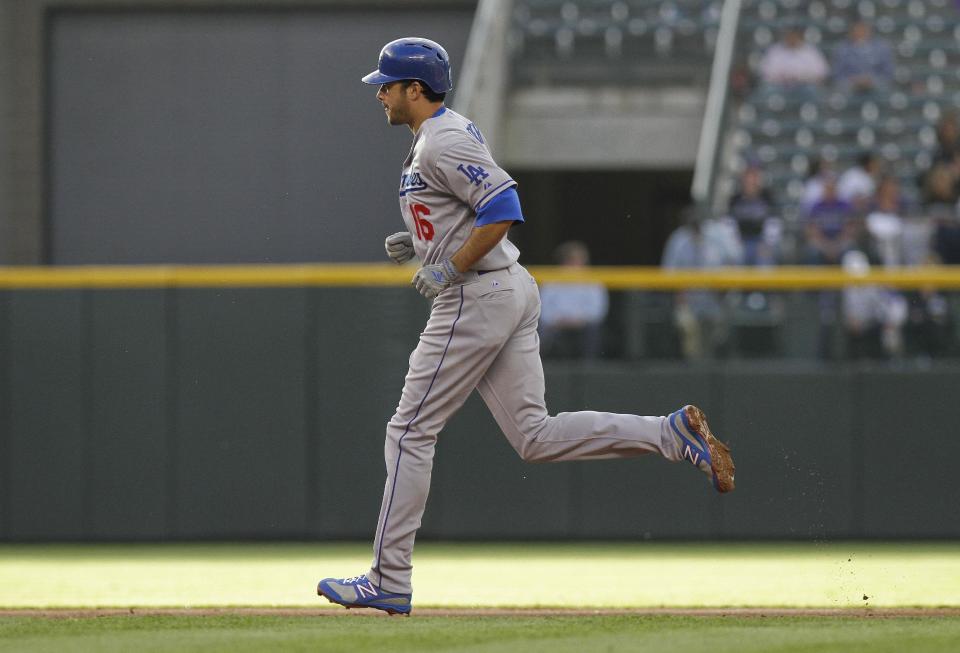 Los Angeles Dodgers ' Andre Ethier (16) rounds the bases after hitting a three-run home run against the Colorado Rockies during the first inning of a baseball game Tuesday, May 1, 2012 in Denver. (AP Photo/Barry Gutierrez)