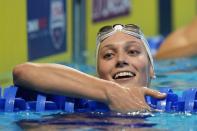 Alex Walsh reacts after winning her heat in the women's 200 individual medley during wave 2 of the U.S. Olympic Swim Trials on Tuesday, June 15, 2021, in Omaha, Neb. (AP Photo/Jeff Roberson)