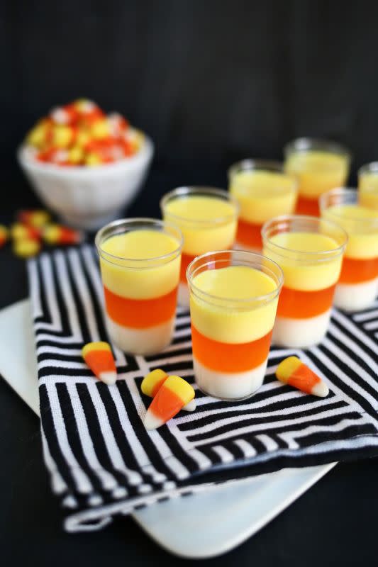 <p>A Beautiful Mess</p><p>Even though this drink is based on a controversial candy, these candy corn jello shots can definitely get the party started off with a hair-raising good time! Find the whole recipe at <a href="https://abeautifulmess.com/candy-corn-jello-shots/" rel="nofollow noopener" target="_blank" data-ylk="slk:A Beautiful Mess;elm:context_link;itc:0;sec:content-canvas" class="link ">A Beautiful Mess</a>. </p>