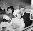 <p>The President and First Lady ride together with Caroline and John F. Kennedy, Jr.<br></p>