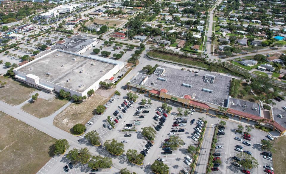 A large building, left, and a Publix store situated on the former site of the Twin City Mall, at the southwest corner of US 1 and Northlake Boulevard, in North Palm Beach, Fla., on Wednesday, April 6, 2023.