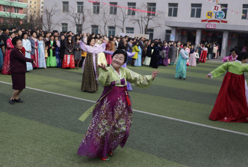 North Korean women dance during the election day at a polling station in Pyongyang, North Korea, Sunday, March 10, 2019. Millions of North Korean voters, including leader Kim Jong Un, are going to the polls to elect roughly 700 members to the national legislature. In typical North Korean style, voters are presented with just one state-sanctioned candidate per district and they cast ballots to show their approval or, very rarely, disapproval. (AP Photo/Dita Alangkara)