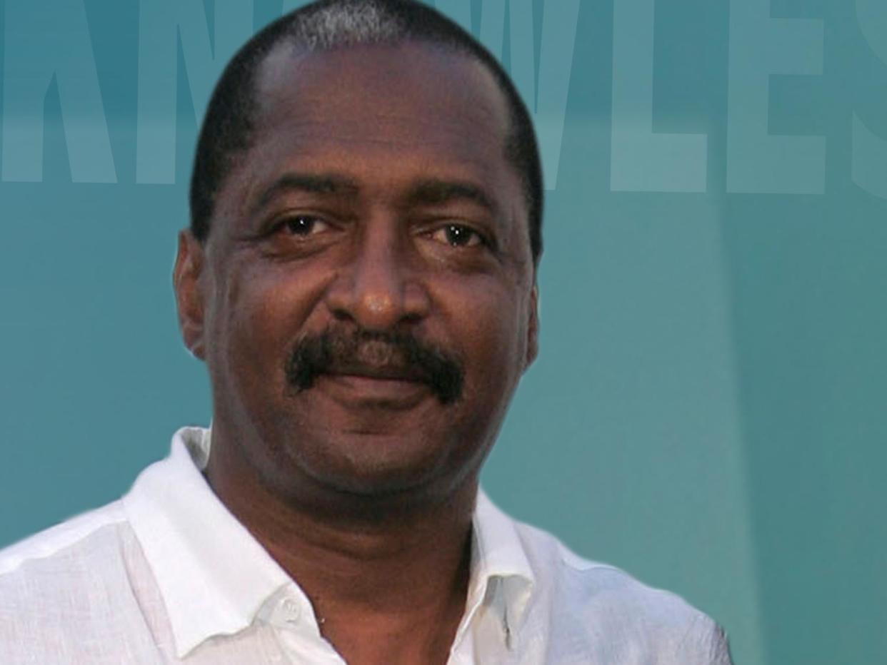 Mathew Knowles headshot, father and manager of singer Beyonce Knowles, on texture, partial graphic 
