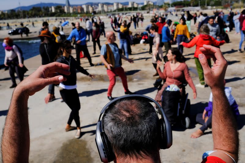 People join socially-distant silent disco in Barcelona