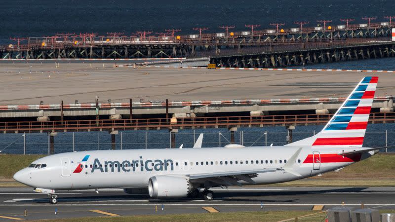 FILE PHOTO: First U.S. commercial flight of a Boeing 737 MAX, since regulators lifted a 20-month grounding in November, lands in New York