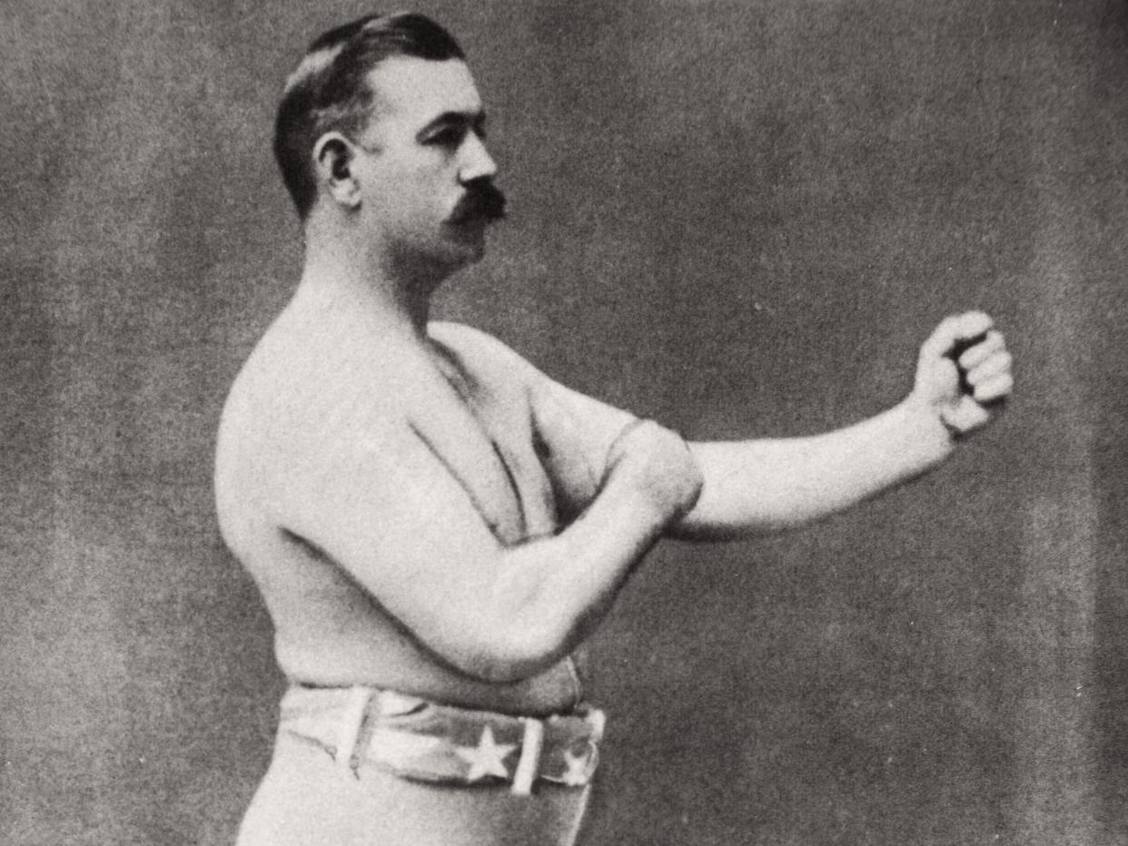 John L Sullivan, American boxer, c1898. Born in Boston, Massachusetts, in 1858, John L Sullivan (1858-1918) is regarded as the first world heavyweight champion. He held the title from 1881 until 1892, when he lost it to James 'Gentleman Jim' Corbett. Sullivan was the first American sportsman to become a national celebrity and the first to earn over $1 million. Artist Unknown. (Photo by Historica Graphica Collection/Heritage Images/Getty Images)