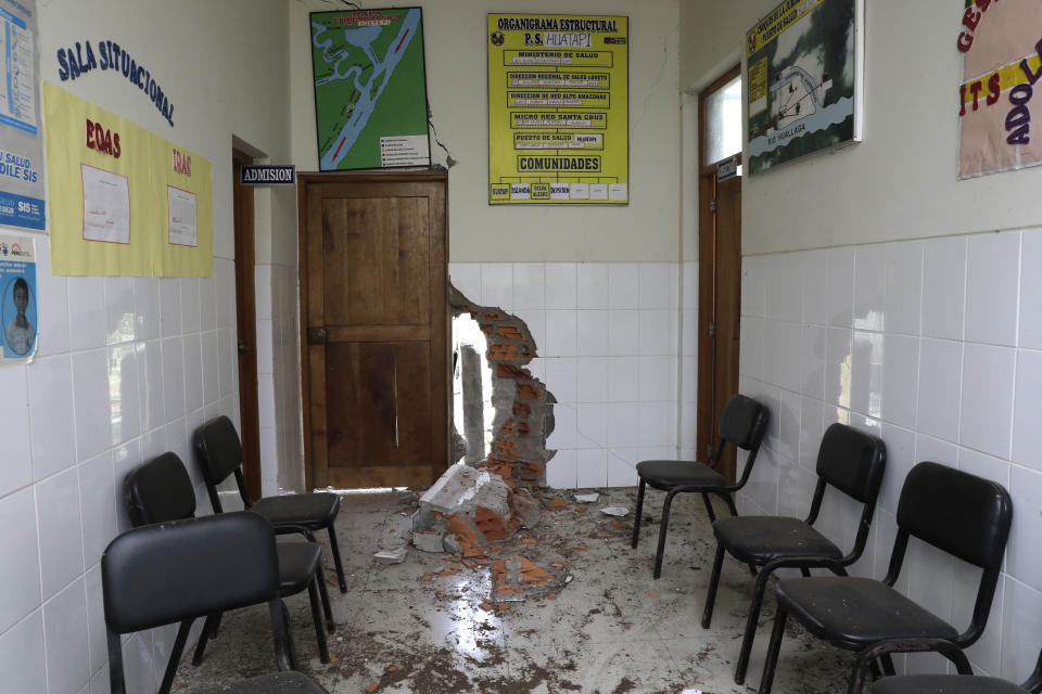 A clinic is damaged after an earthquake in Huatapi, on the outskirts of Yurimaguas, Peru, Sunday, May 26, 2019. A powerful magnitude 8.0 earthquake struck a remote part of the Amazon jungle in Peru early Sunday, collapsing buildings and knocking out power to some areas. (Guadalupe Pardo/Pool photo via AP)