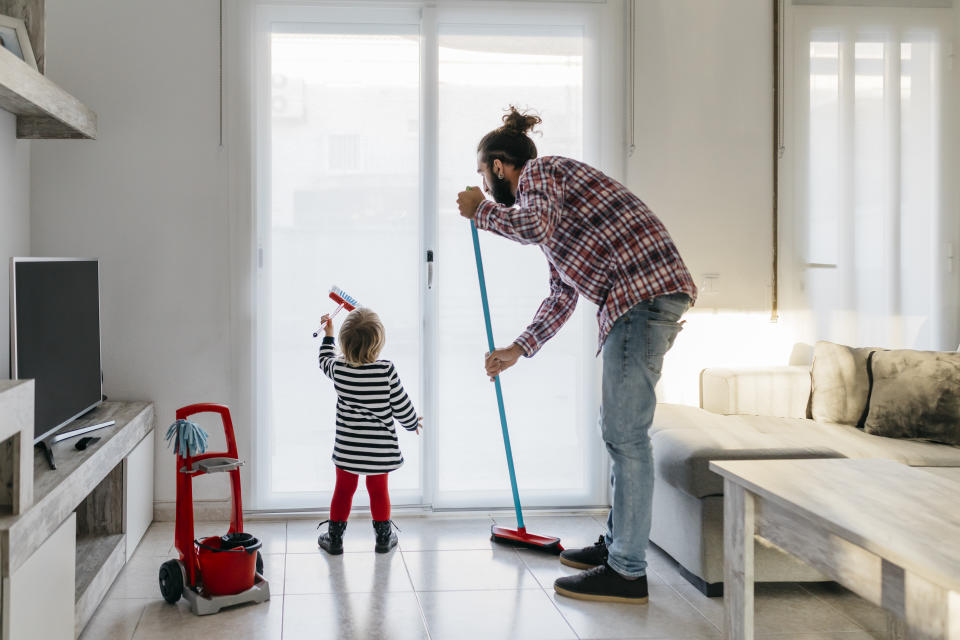 Doing your fair share of cleaning is a hallmark of a modern man. (Getty Images)