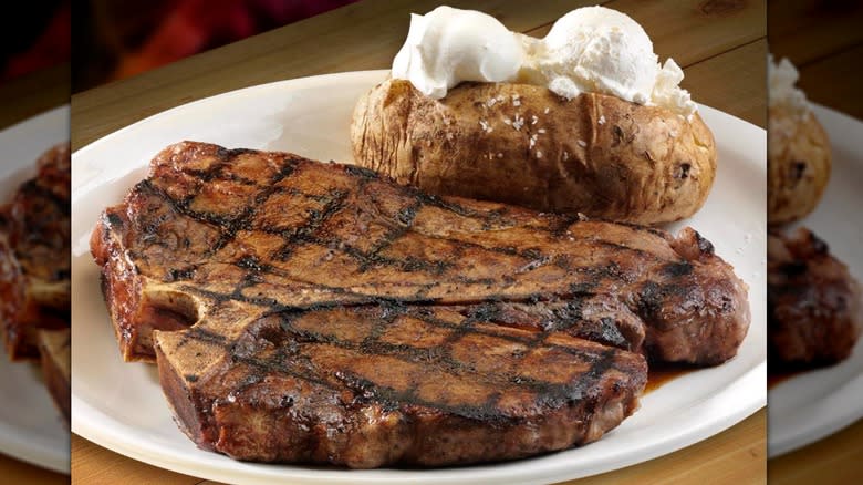 steak with potato on plate