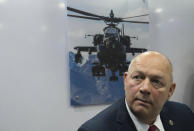 U.S. Federal Aviation Administration administrator Steve Dickson speaks to journalists at the Dubai Airshow in Dubai, United Arab Emirates, Wednesday, Nov. 20, 2019. Dickson said Wednesday that the FAA wouldn't be pressured to rush approvals to allow the troubled Boeing 737 Max to fly again. (AP Photo/Jon Gambrell)