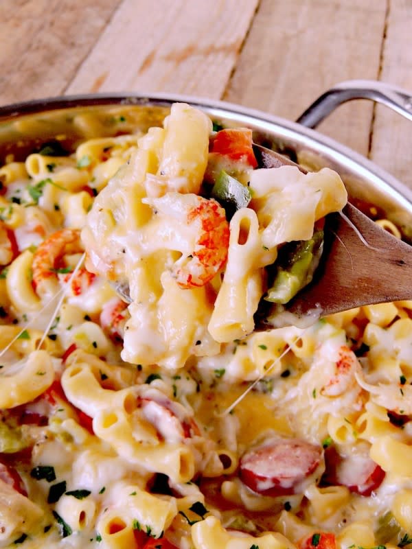 <p>Bobbi's Kozy Kitchen</p><p>This Jambalaya Pasta with Crawfish and Sausage recipe gives you all of the authentic flavors of your New Orlean's fave, all wrapped in a cheesy pasta dish.</p><p><strong>Get the recipe: <a href="https://www.bobbiskozykitchen.com/2016/02/jambalaya-pasta-with-crawfish-and.html" rel="nofollow noopener" target="_blank" data-ylk="slk:Jambalaya Pasta with Crawfish and Sausage;elm:context_link;itc:0;sec:content-canvas" class="link rapid-noclick-resp">Jambalaya Pasta with Crawfish and Sausage</a></strong></p>