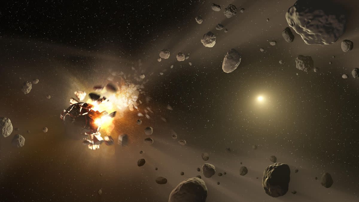  This artist concept catastrophic collisions between asteroids located in the belt between Mars and Jupiter and how they have formed families of objects on similar orbits around the sun. 