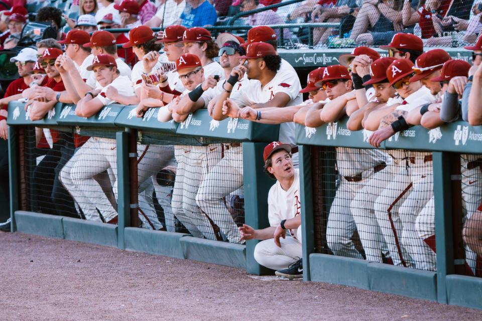 The Arkansas baseball dugout looks on during the Razorbacks' 5-4 victory over Texas Tech Wednesday, April 17, 2024.
