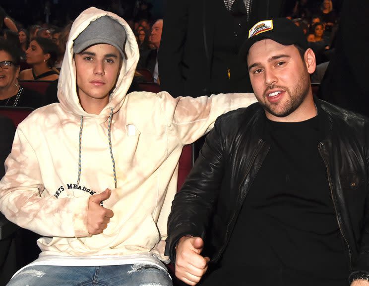 Justin Bieber and Scooter Braun are rough and tumble best buds. (Photo: Jeff Kravitz/AMA2015/FilmMagic)
