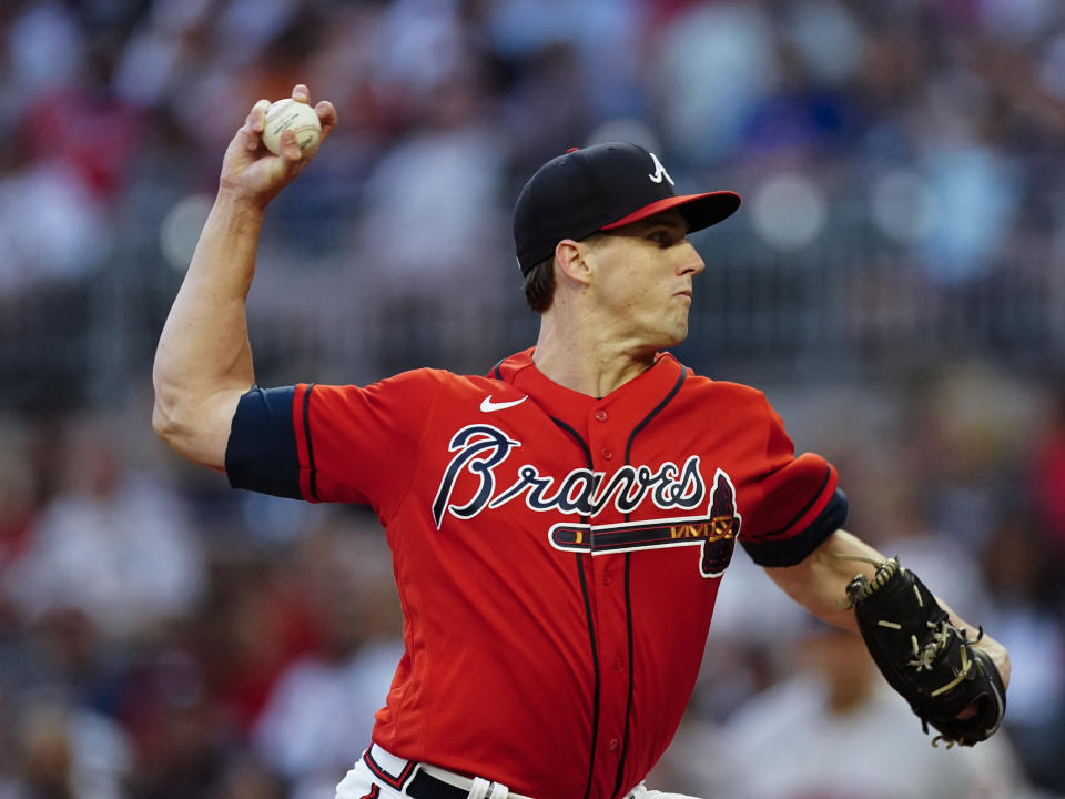 Atlanta Braves starting pitcher Kyle Wright (30) works in the first inning of a baseball game against the Houston Astros Friday, Aug. 19, 2022, in Atlanta. (AP Photo/John Bazemore)