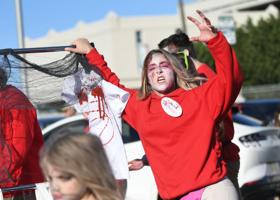 A participant is shown at the 2022 Asbury Park Zombie Walk on October 8th.