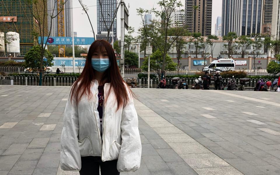 Song Huangqin, 20, who is only allowed outside her housing compound for two hours each day despite lockdowns technically lifting in Wuhan - Sophia Yan