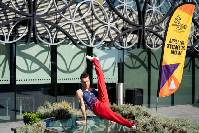 Max Whitlock poses in front of the Library of Birmingham