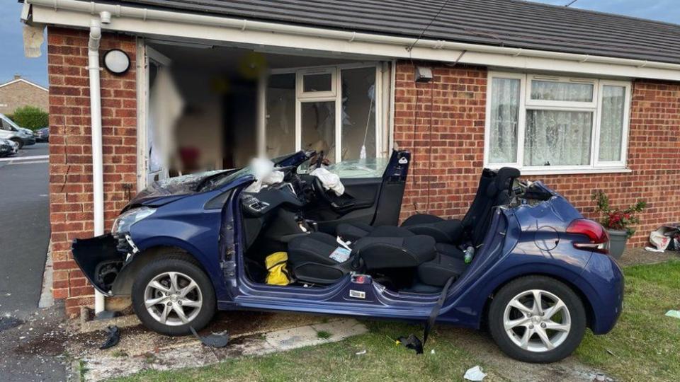 A car crashed into a bungalow in Cambridgeshire. (Police)